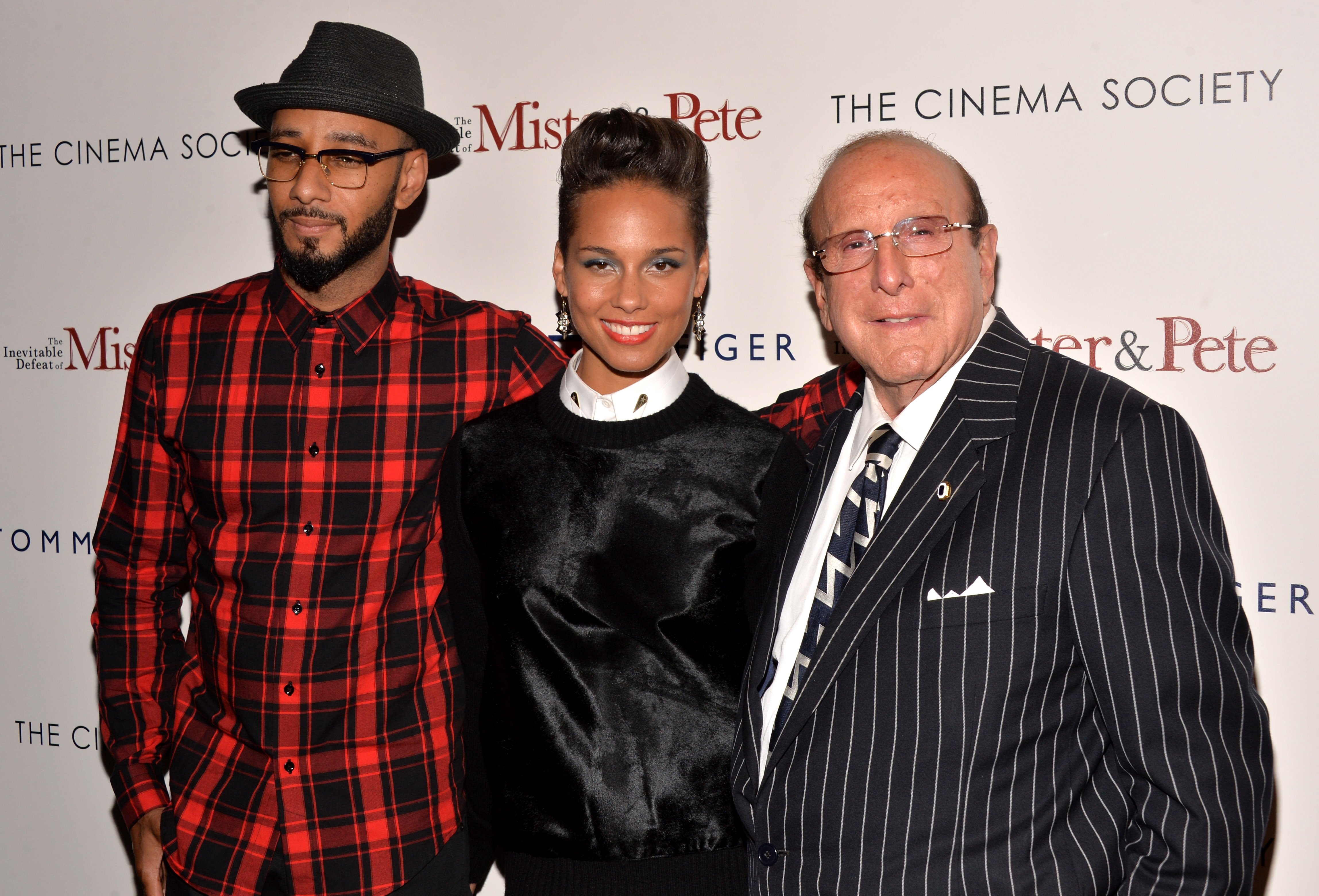 Swizz Beatz, Alicia Keys and Record producer Clive Davis attend The Cinema Society & Tommy Hilfiger screening of 'The Inevitable Defeat of Mister & Pete' at Tribeca Grand Screening Room on October 2, 2013 in New York City