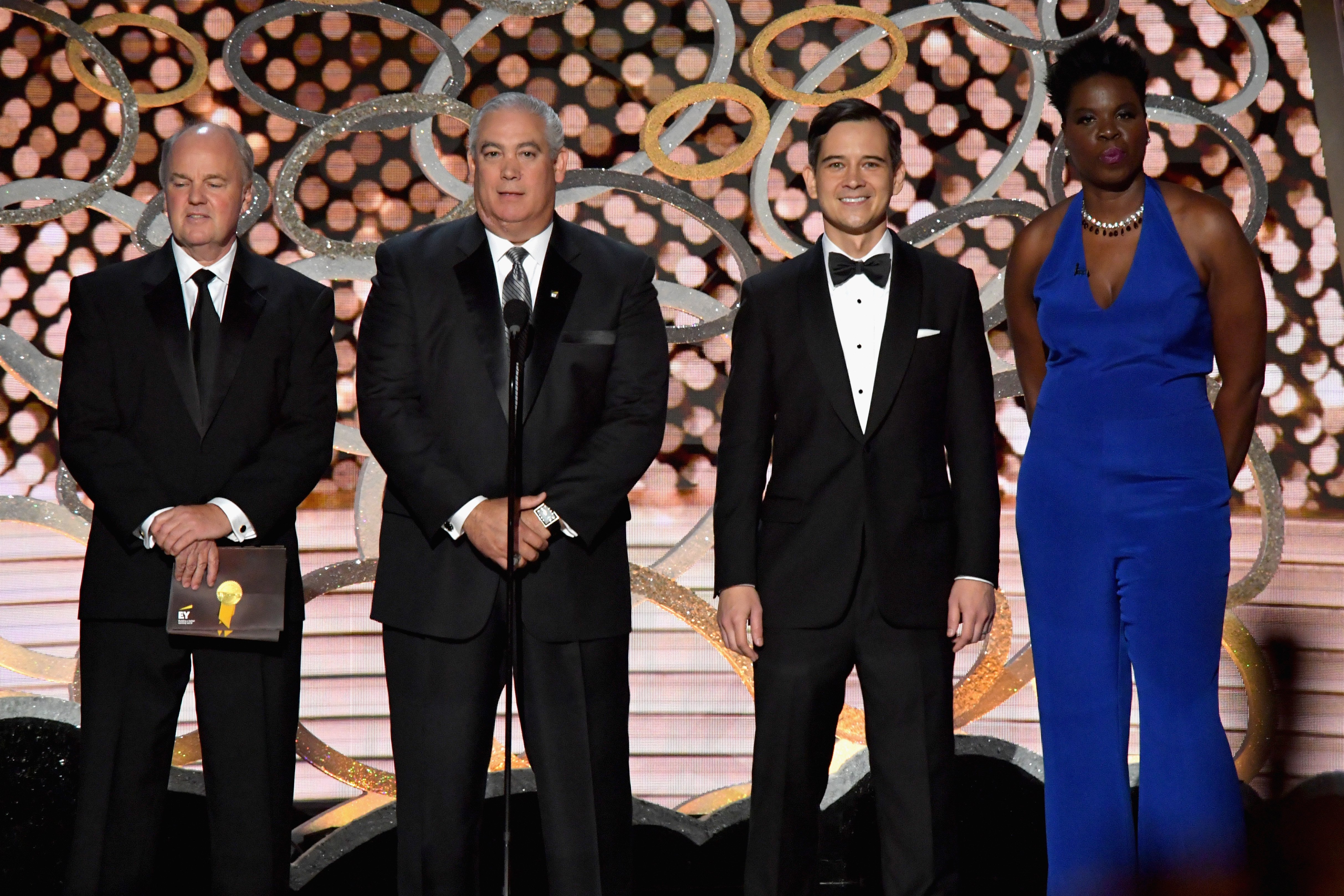 Leslie Jones and representatives of Ernst & Young speak onstage during the 68th Annual Primetime Emmy Awards at Microsoft Theater on September 18, 2016 in Los Angeles