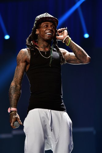 Lil Wayne performs onstage at the 2015 iHeartRadio Music Festival at MGM Grand Garden Arena on September 18, 2015 in Las Vegas