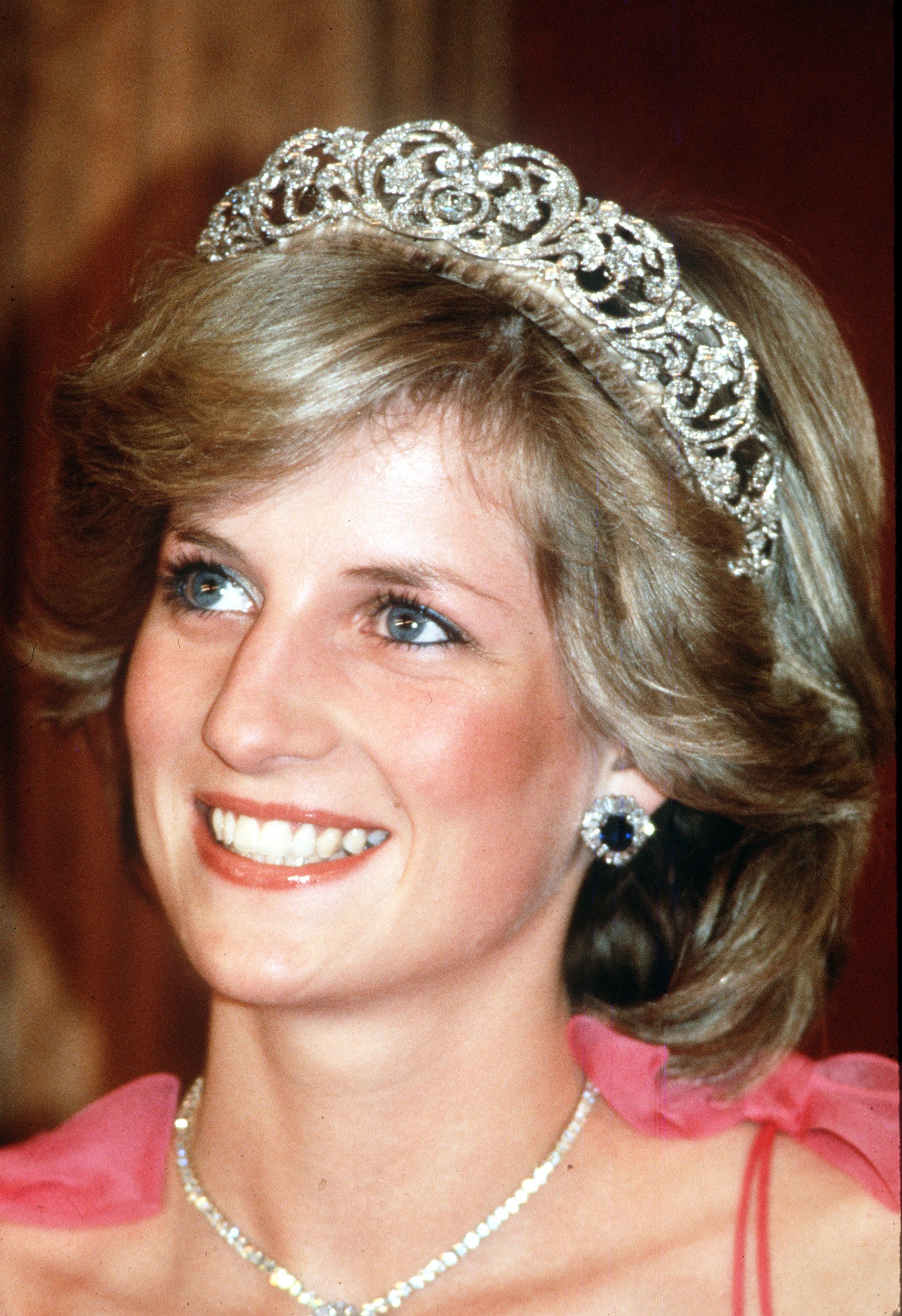  Princess Diana, Princess of Wales, smiles while wearing the Spencer Family Tiara at a State Reception in Brisbane, Australia in April, 1983