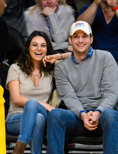 Mila Kunis and Ashton Kutcher attend a basketball game between the Oklahoma City Thunder and the Los Angeles Lakers at Staples Center on December 19, 2014 in Los Angeles