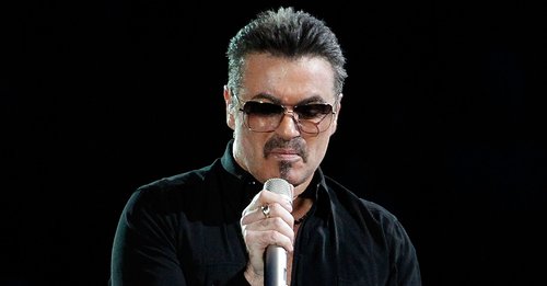 George Michael performs on stage in concert on the first night of his 'George Michael Live' Australian tour at Burswood Dome on February 20, 2010 in Perth, Australia
