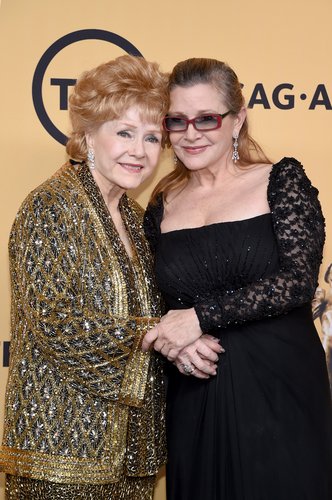 Debbie Reynolds, recipient of the Screen Actors Guild Life Achievement Award, and Carrie Fisher pose in the press room at the 21st Annual Screen Actors Guild Awards at The Shrine Auditorium on January 25, 2015 in Los Angeles