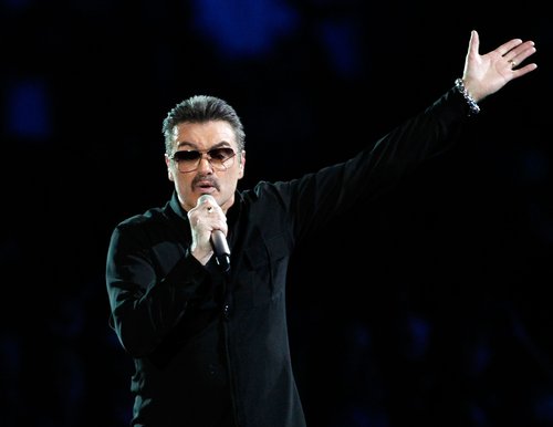 George Michael performs on stage in concert on the first night of his 'George Michael Live' Australian tour at Burswood Dome on February 20, 2010 in Perth