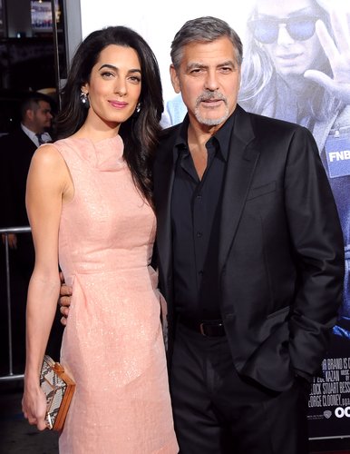 Amal Alamuddin Clooney and actor/producer George Clooney arrive at the premiere of Warner Bros. Pictures' 'Our Brand Is Crisis' at TCL Chinese Theatre on October 26, 2015 in Hollywood