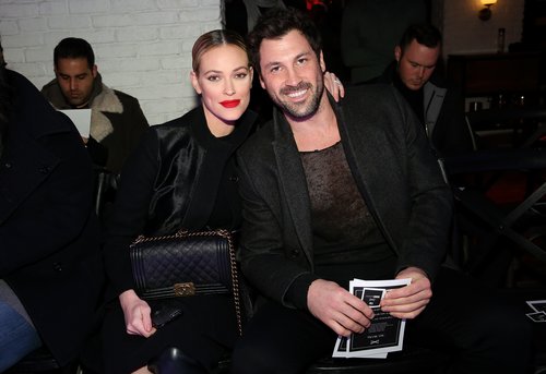 Peta Murgatroyd and Maksim Chmerkovskiy attend the VALENTINNICOLE fashion show during New York Fashion Week at Lovage on February 9, 2017 in New York City