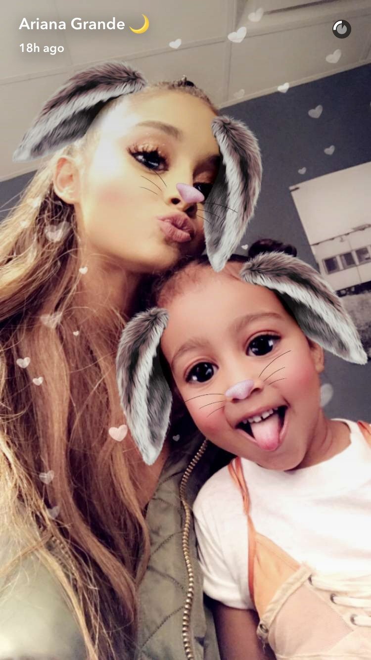 Ariana Grande and North West pose in a Snapchat selfie taken on March 31, 2017