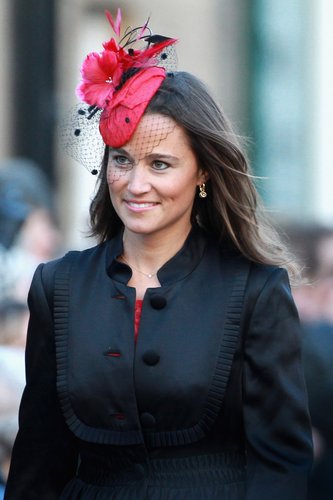 Pippa Middleton attends the wedding of Katie Percy to Patrick Valentine at St Michael's Church in Alnwick, Northumberland on February 26, 2011 in Alnwick, England