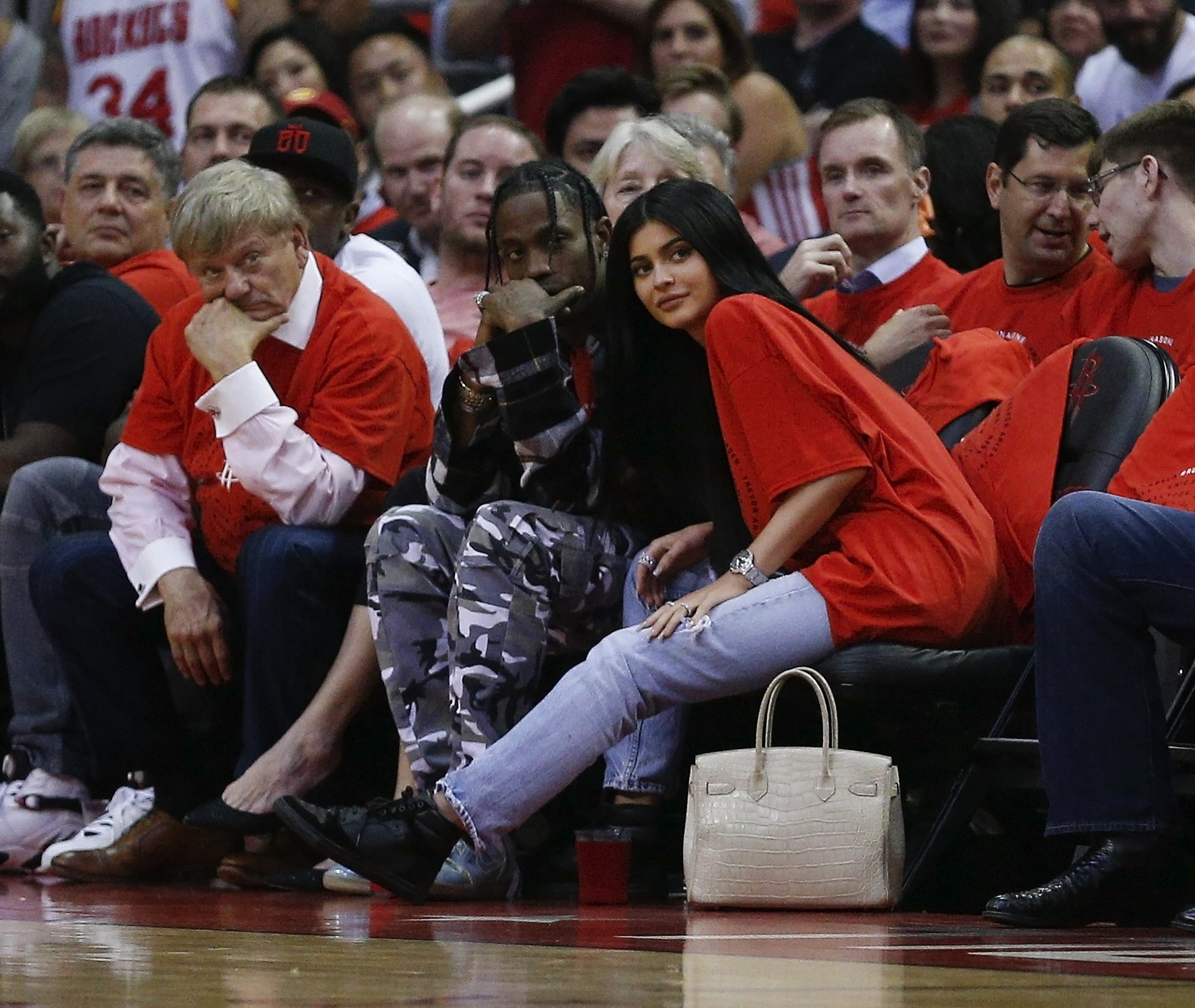 Travis Scott and Kylie Jenner watch courtside during Game Five of the Western Conference Quarterfinals game of the 2017 NBA Playoffs on April 25, 2017 in Houston
