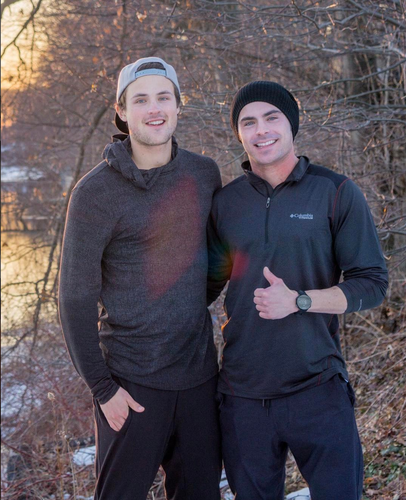 Zac Efron and his brother Dylan spend some quality time fishing in the woods