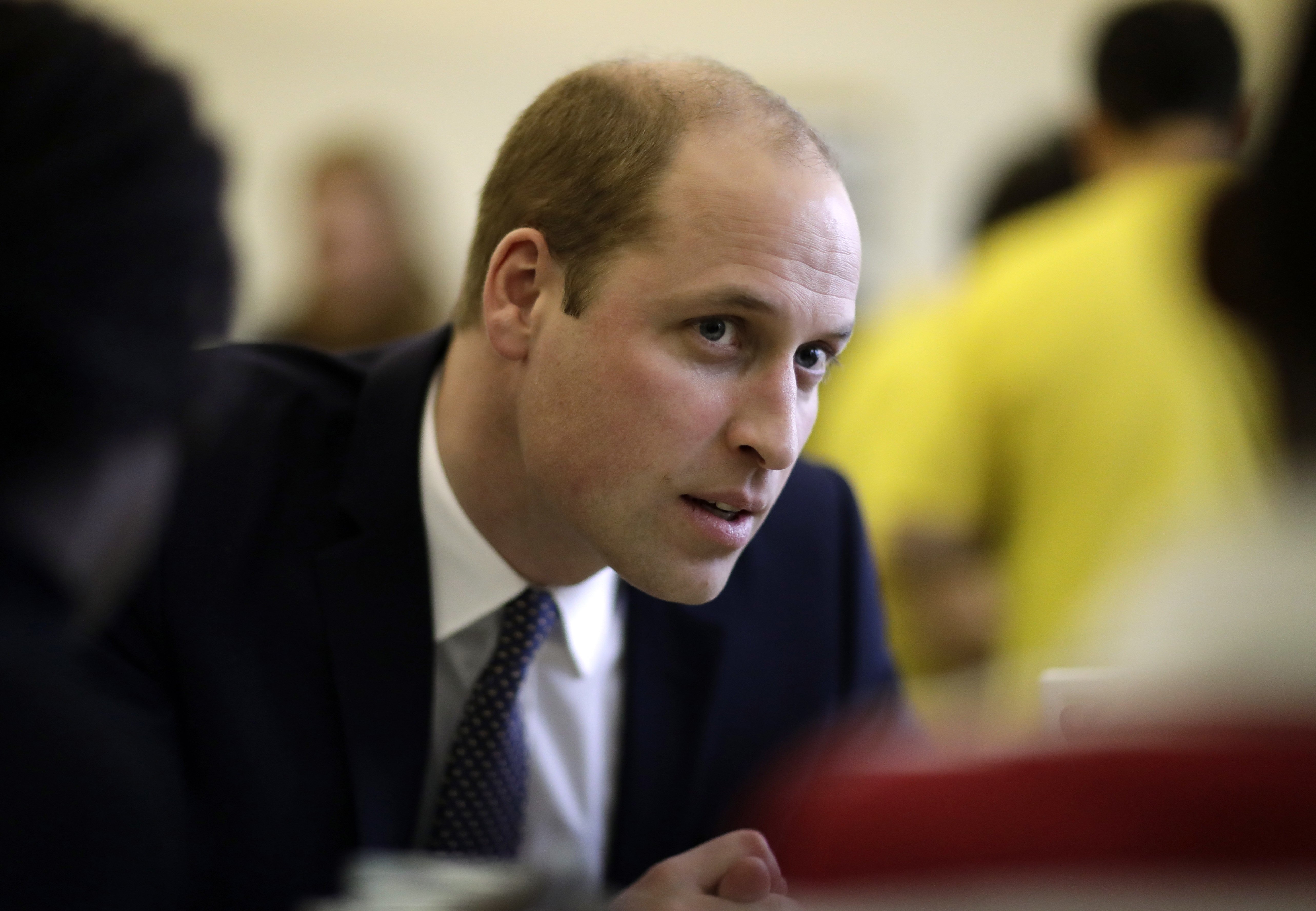 Prince William, Duke of Cambridge speaks to families at the Child Bereavement UK Centre in Stratford on January 11, 2017 in London