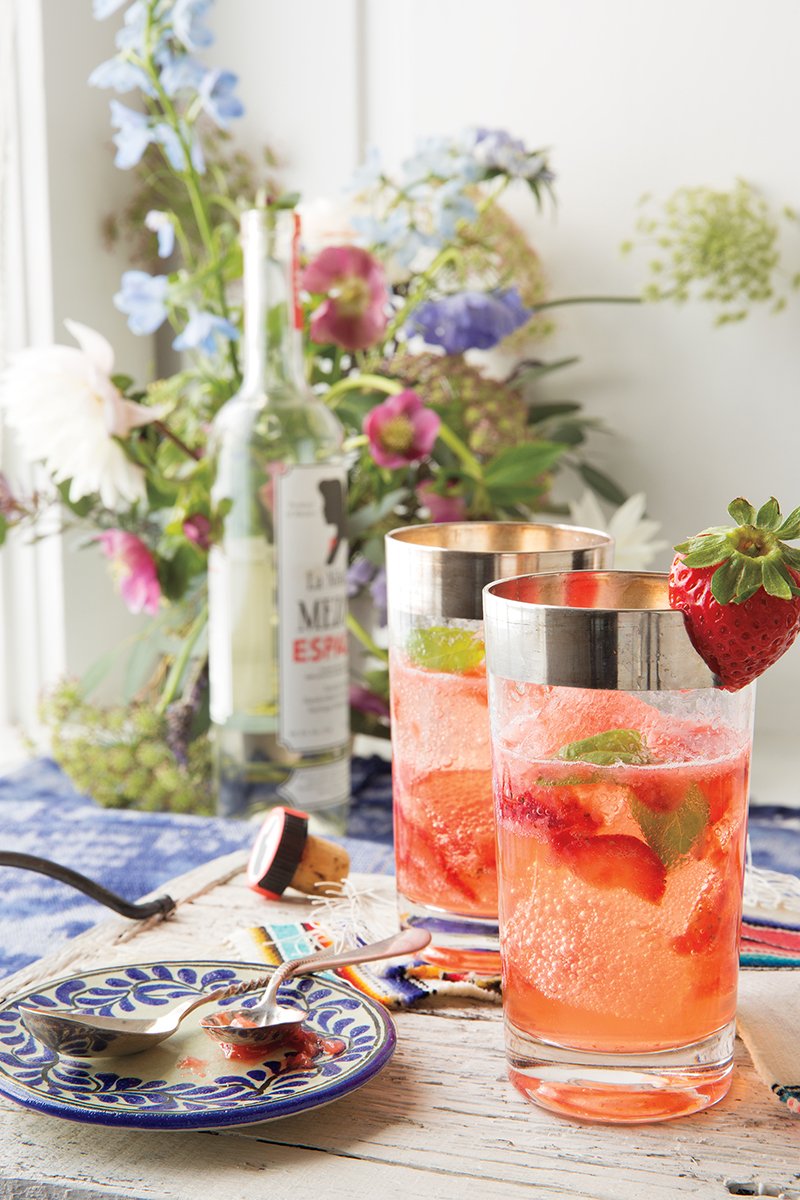 Strawberry and Thai Basil Mojito from 'Casa Marcela' by Marcela Valladolid and Coral Von Zumwalt. Copyright © 2017 by Marcela Valladolid and Coral Von Zumwalt. Used by permission of Houghton Mifflin Harcourt. All rights reserved.