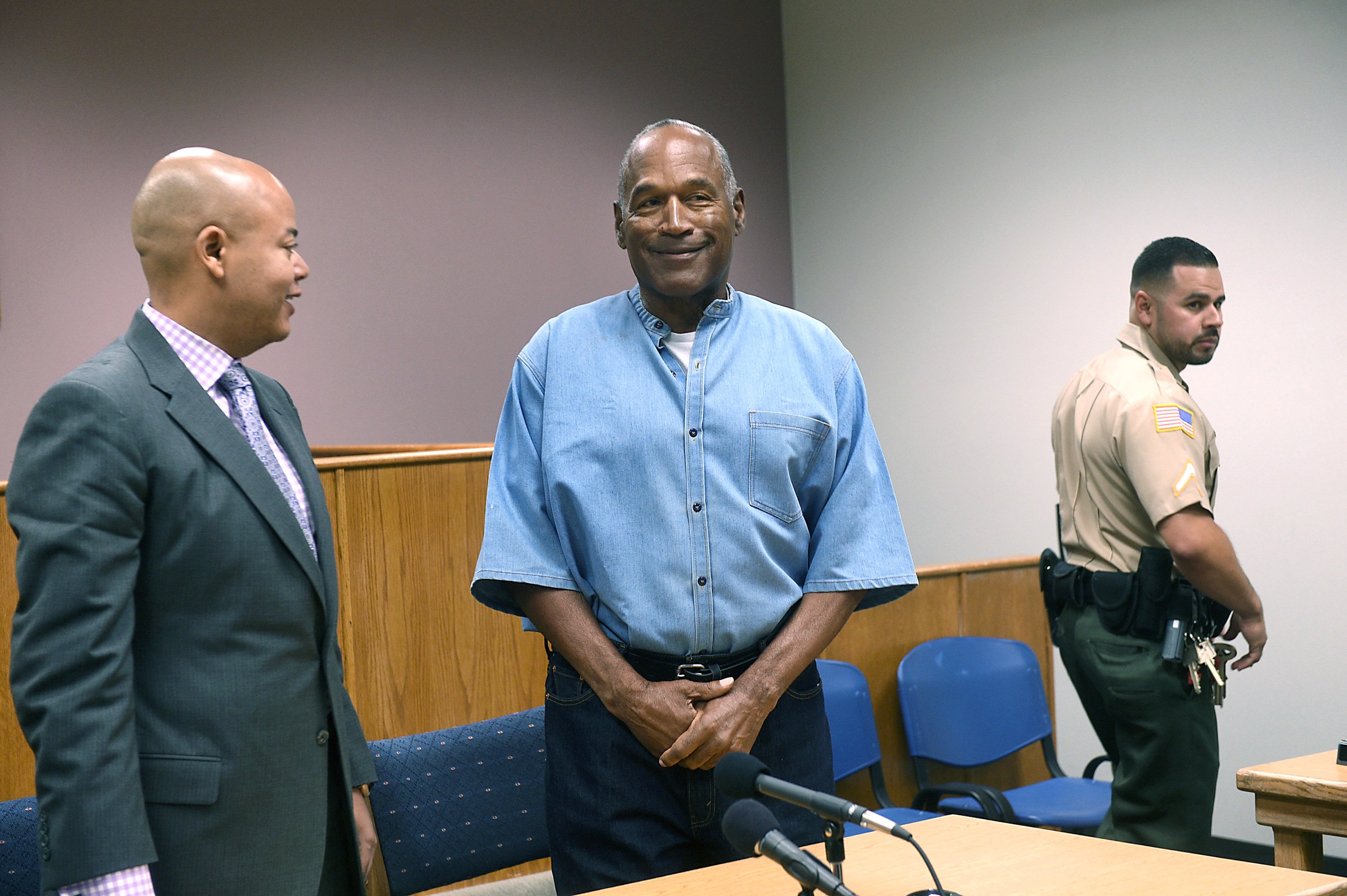 O.J. Simpson arrives for his parole hearing with his attorney Malcolm LaVergne at Lovelock Correctional Center July 20, 2017 in Lovelock, Nevada