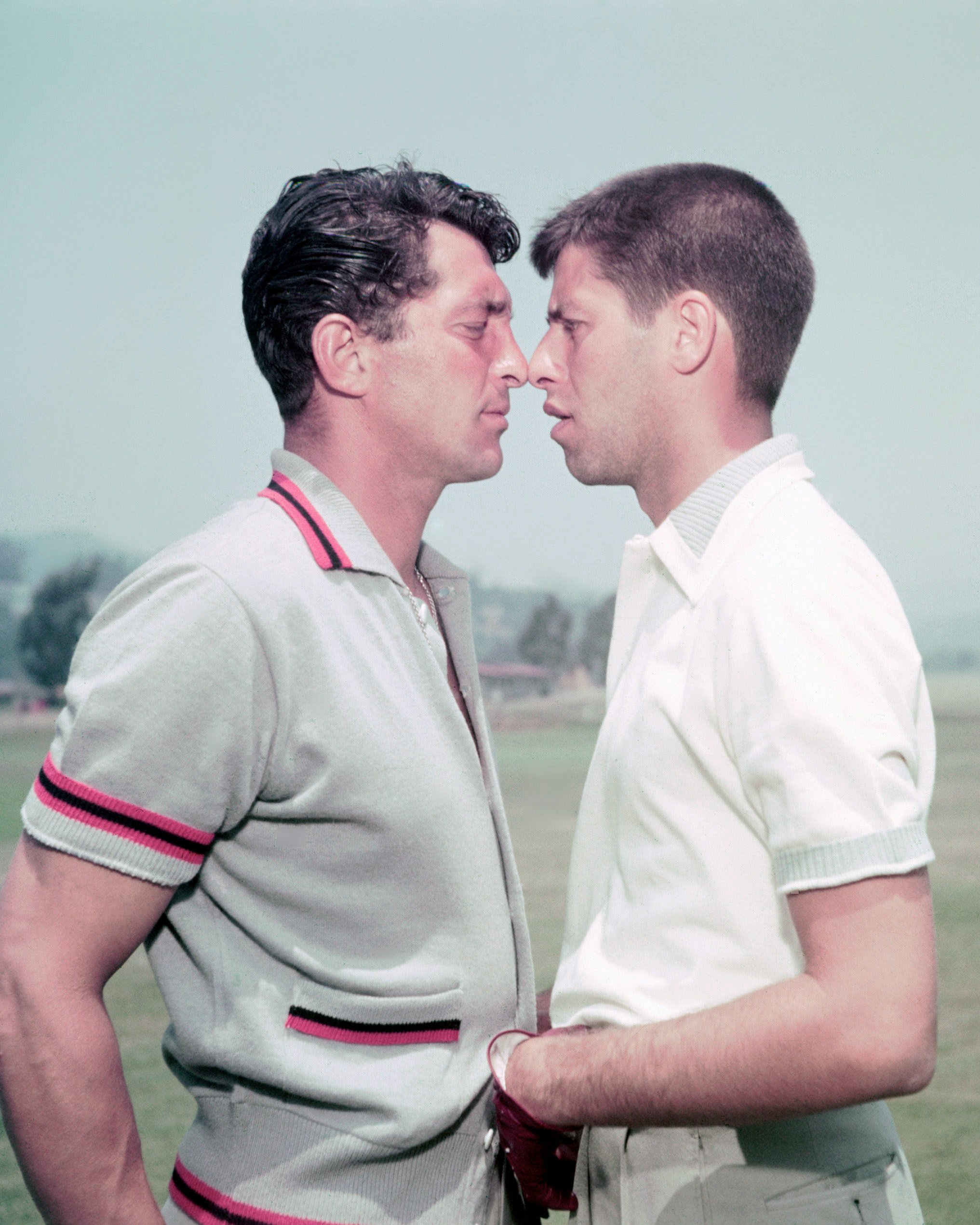 Dean Martin (1917-1995) with Jerry Lewis (1926-2017) squaring up to each other, face to face, USA, circa 1952.