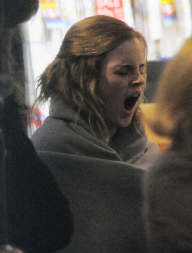 Emma Watson yawning on the set of Harry Potter and the Deathly Hallows.