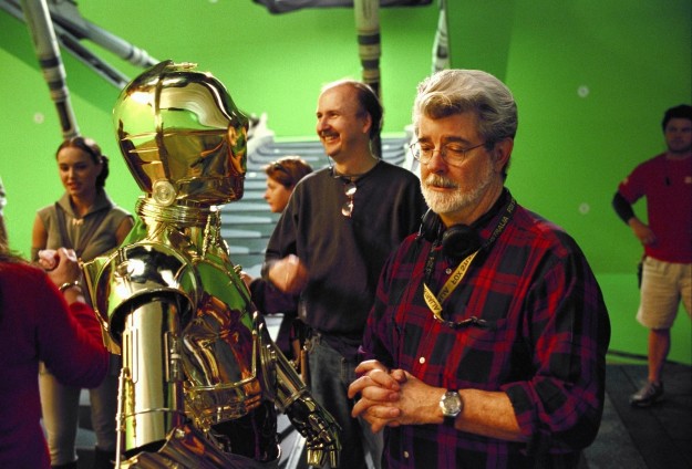 George Lucas chatting with Anthony Daniels (R2D2) on the set of Star Wars Episode III: Revenge of the Sith.