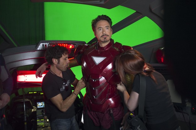 Robert Downey Jr. gets costume adjustments on set of The Avengers.