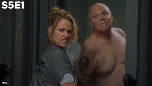 On the Season 5 premiere of Brooklyn Nine-Nine, Hitchcock takes off his shirt, revealing a tattoo of himself with a gun in his mouth...