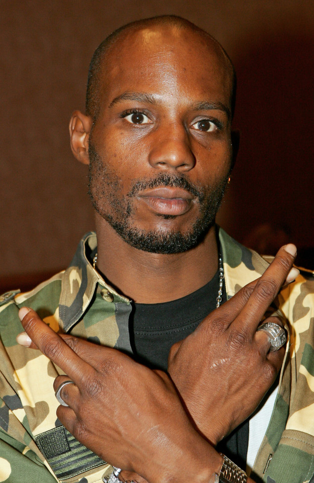 For those unfamiliar with the Eve's history, Ruff Ryders is the record label she began her career on, which was created by DMX. Here's an image of him throwing up the hand sign.