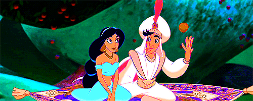 In Aladdin, he tosses an apple at Jasmine while they're flying through ancient Greece. In ancient Greece, throwing an apple was a way of expressing love to another person.
