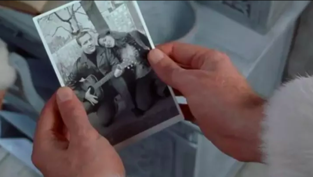 When Buddy learns he was adopted and not technically an elf, he's shown a picture of his real parents which is when he learns his mother is already dead.