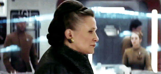 For that royal fuck-up — not to mention deliberately disobeying the orders of the highest-ranking member of the Resistance, GENERAL FREAKING LEIA ORGANA — Poe gets a slap on the wrist (and the face) and a demotion.