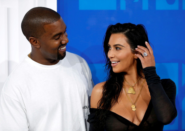 Kim Kardashian and Kanye West have welcomed their third child into the world, the couple announced Tuesday. The baby girl was born via a surrogate shortly after midnight on Monday.