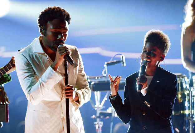 Well, towards the end of his Grammys performance on Sunday night, Childish Gambino brought out a tween to come sing with him.