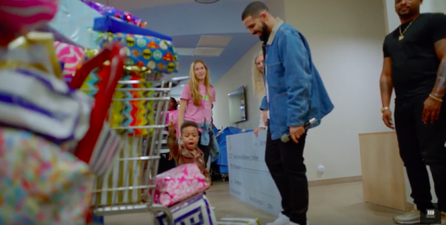 "God's Plan," directed by Karena Evans, shows Drake spending time with the Miami community.