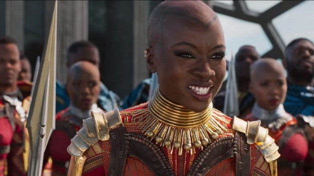 Okoye has gold armor (versus the rest of the elite squad’s silver), which denotes her rank as the Dora Milaje’s general.