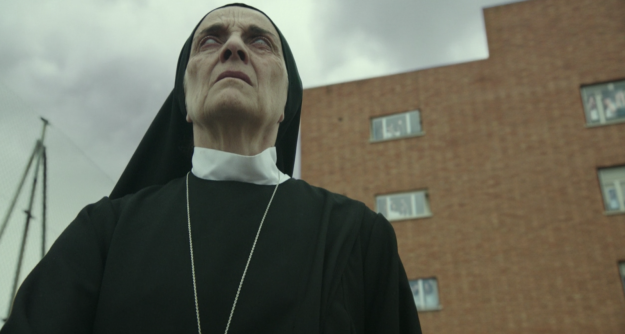 About 15 minutes in nothing creepy has happened, but a nun is staring into the sun during a solar eclipse so you can feel something coming.