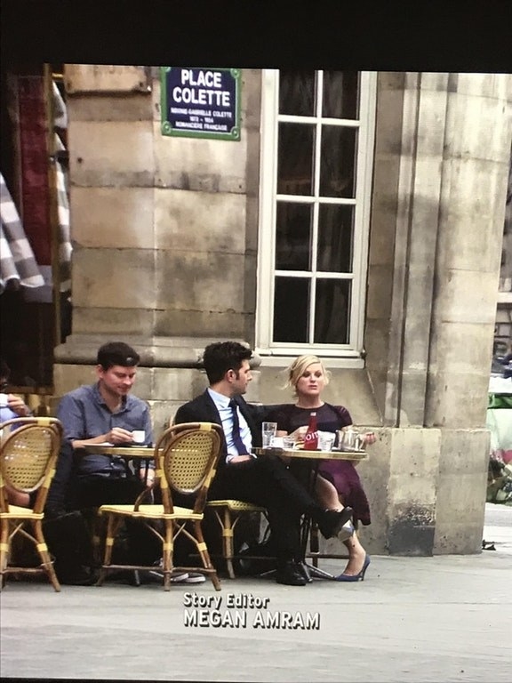 When Ben and Leslie go to Paris, they have lunch right next to Mose from The Office.
